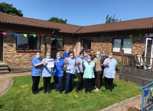 Staff-celebrating-Good-rating-Spiers-Care-Home-Anavo-Group_